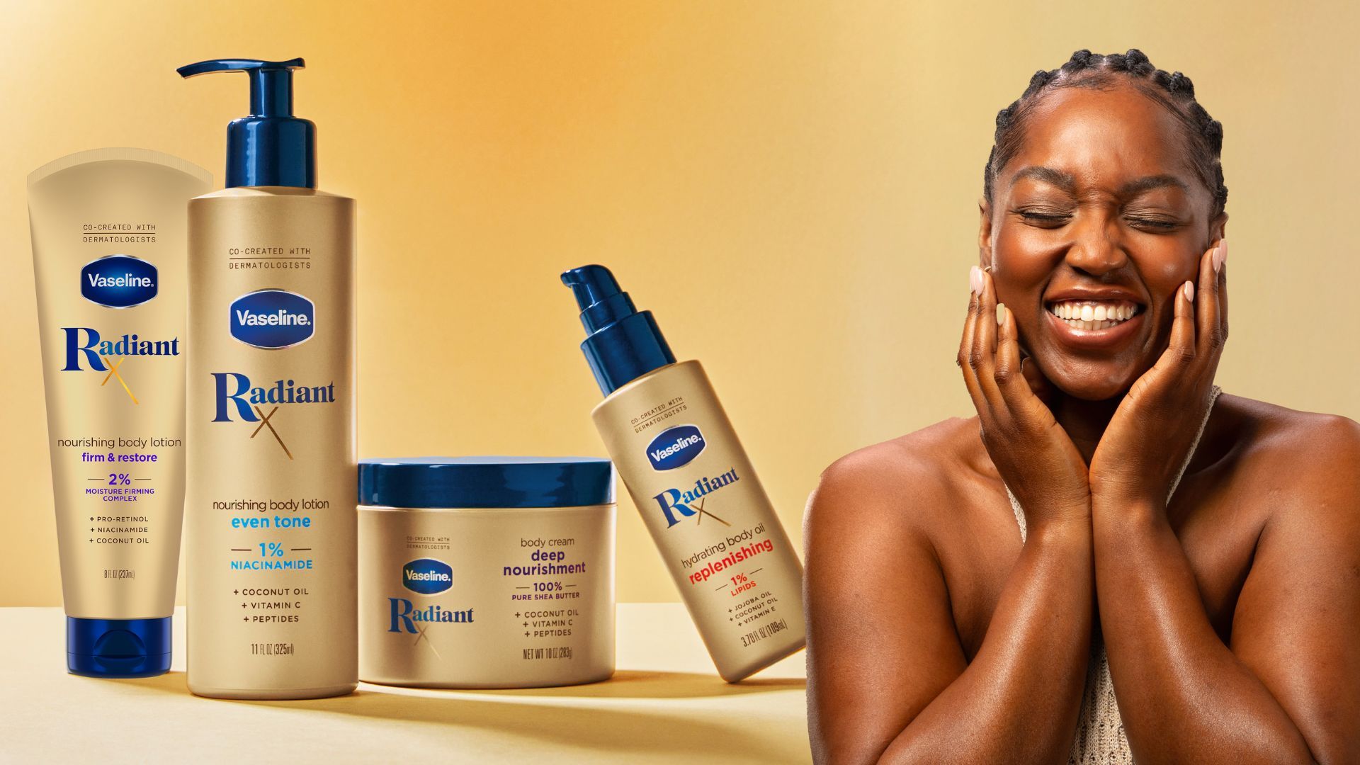 A campaign image for Vaseline Radiant X, featuring a Black woman laughing, and a range of four products in gold and blue packaging including body lotions and body oil.