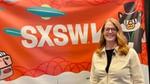 Dr Samantha Samaras, SVP, Science & Technology, Personal Care, Unilever, standing smiling in front of a bright SXSW conference banner.
