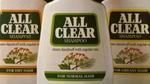 Three bottles of All Clear Shampoo, each designed for different hair types: Dry Hair, Normal Hair and Greasy Hair. The labels feature green branding with the text 'clears dandruff with regular use', along with an illustration of flowers and leaves on each bottle.