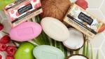 Image shows Alberto Balsam Shampoo Bars surrounded by opened coconuts, apples and raspberries