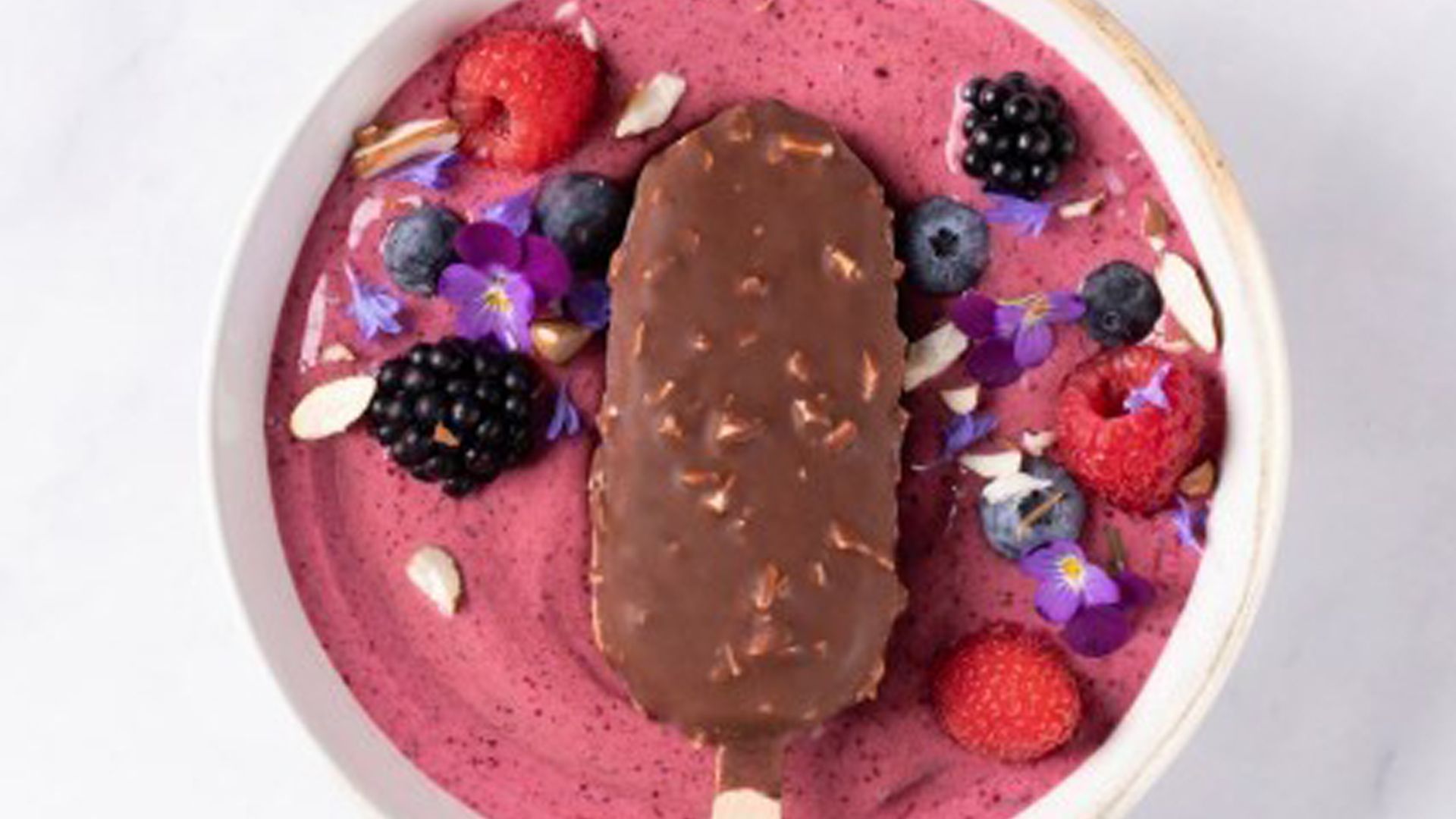Magnum vegan ice cream in a berry smoothie bowl