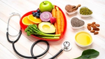 Various food items next to a stethoscope.