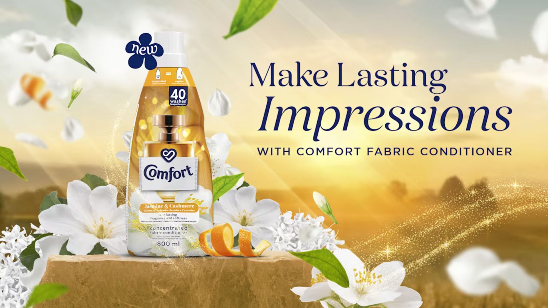 Comfort fabric conditioner bottle with flowers and text 'Make Lasting Impressions'.