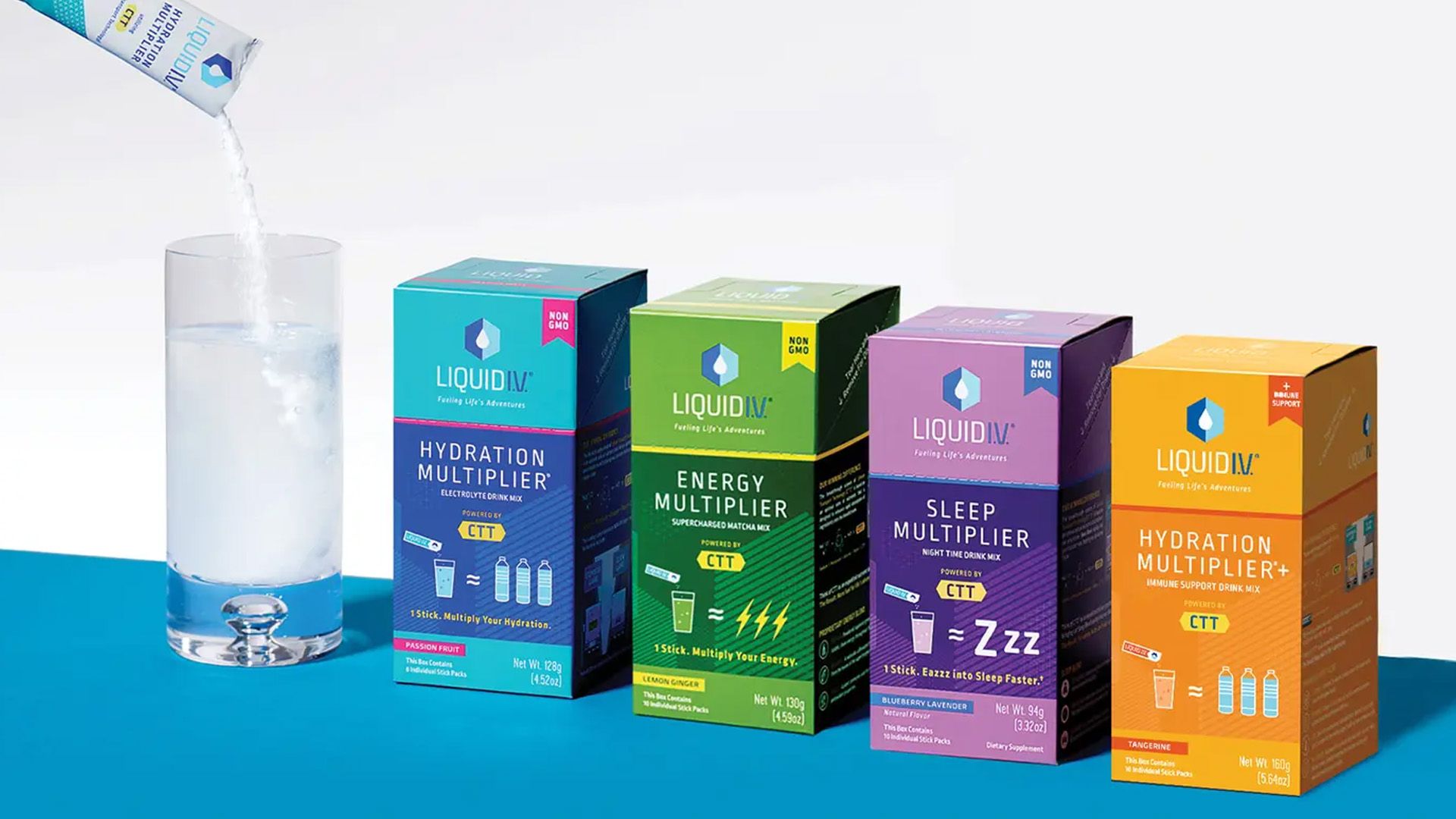 Four products from the Liquid IV range, part of Unilever’s Beauty & Wellbeing portfolio. A hydration powder is being added to a glass of water.