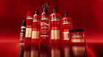An image of red sprays, bottles and packs from Unilever’s TRESemmé hair care range, created using digital twin technology.